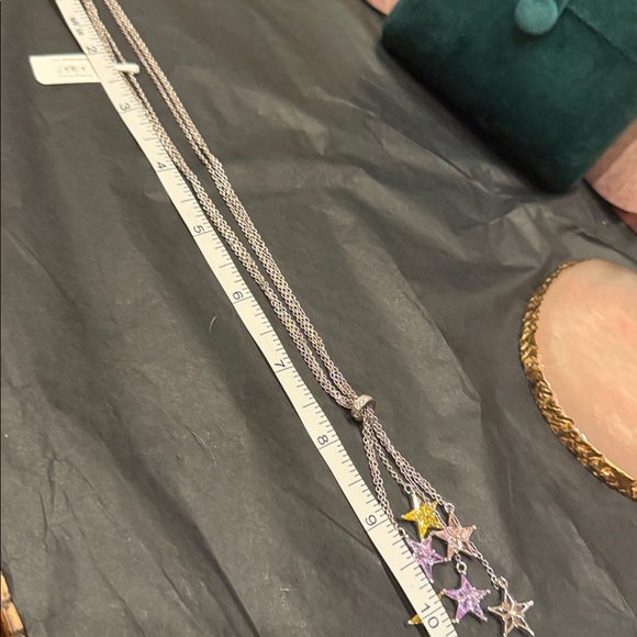 Elegant Silver and Gold Star Necklace - Picture 10 of 11